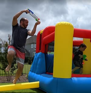 Justin playing with his kids